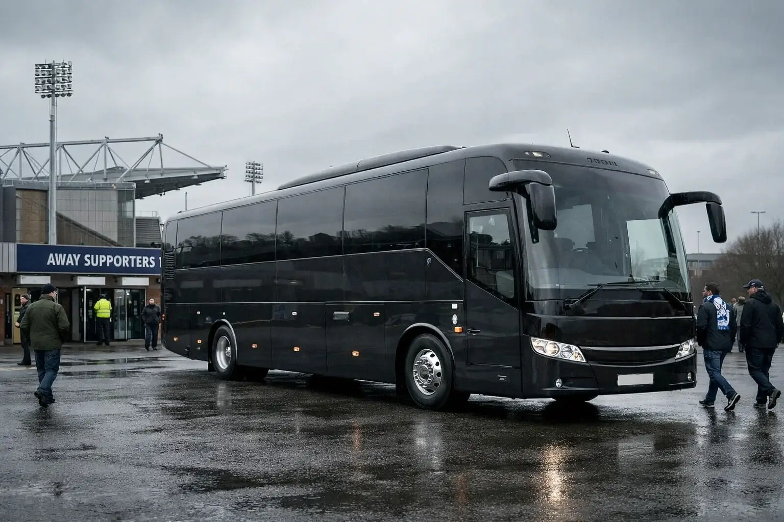 Professional football team coach bus parked outside an away stadium before match